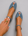 Elegant suede ballerinas with metallic trim and open toe
