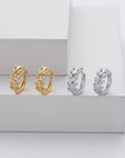 Silver earrings in the shape of a leaf