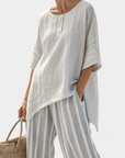 Talvora | Elegant Asymmetrical Blouse & Striped Pants