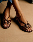 Metal stud sandals with openings in dark brown