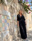 Emene | Draped V Neck Wide Leg Relaxed Jumpsuit