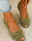 Flat open-toe sandals with crisscrossed fabric