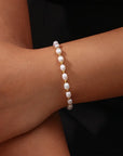 Elegant Pearl and Gold Bracelet