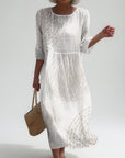 Améliane™ — Elegant midi dress with delicate details
