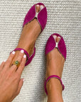Elegant suede ballerinas with metallic trim and open toe