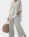 Talvora | Elegant Asymmetrical Blouse & Striped Pants