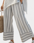 Talvora | Elegant Asymmetrical Blouse & Striped Pants